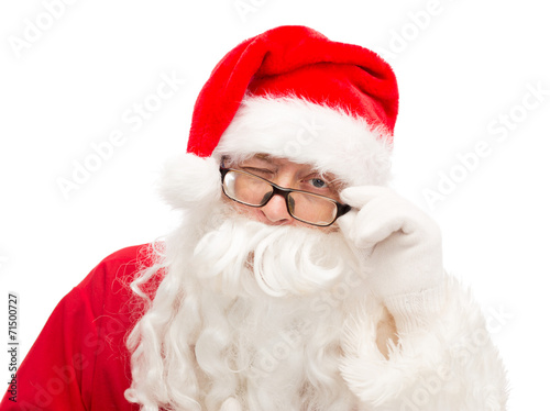 close up of santa claus winking