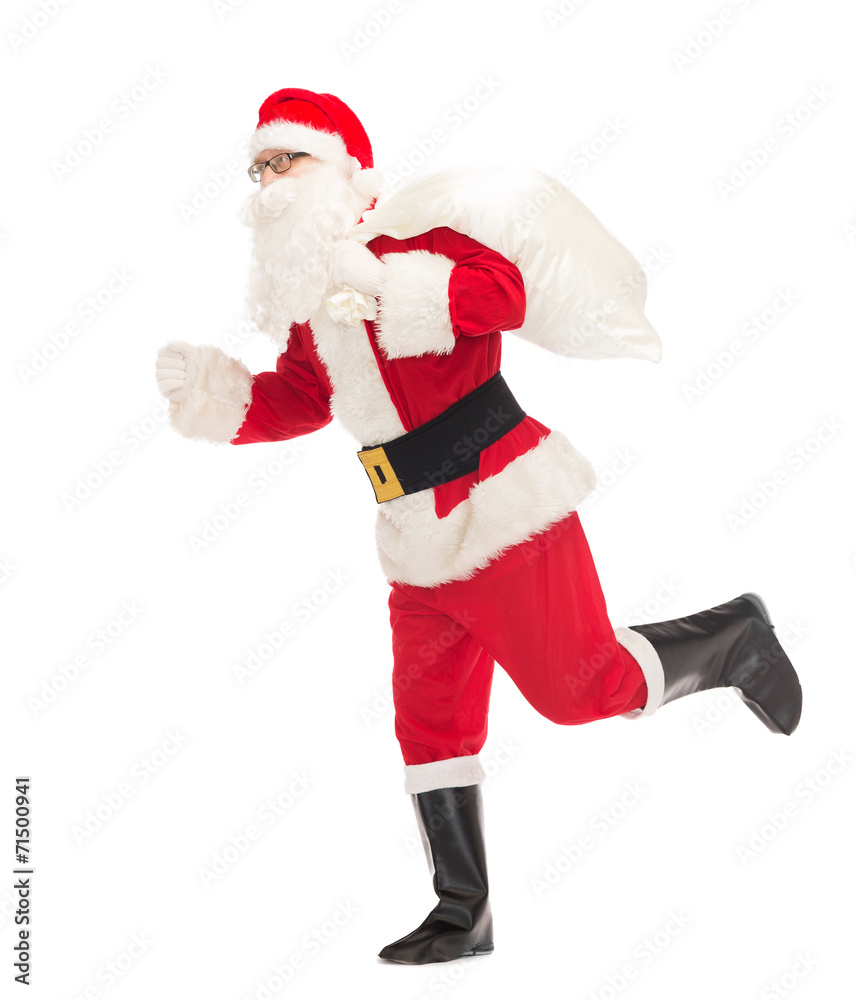 man in costume of santa claus with bag man in costume of santa claus with bag