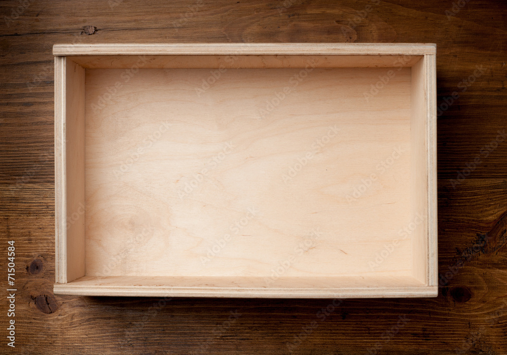 Empty wooden box on brown background. Empty wooden box on brown background.