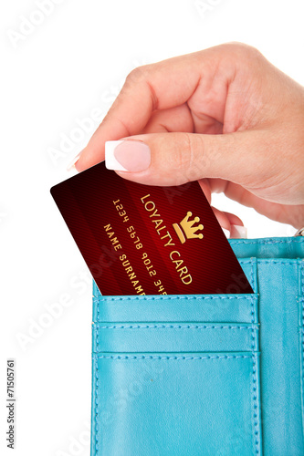 hand holding loyalty card in wallet isolated over white