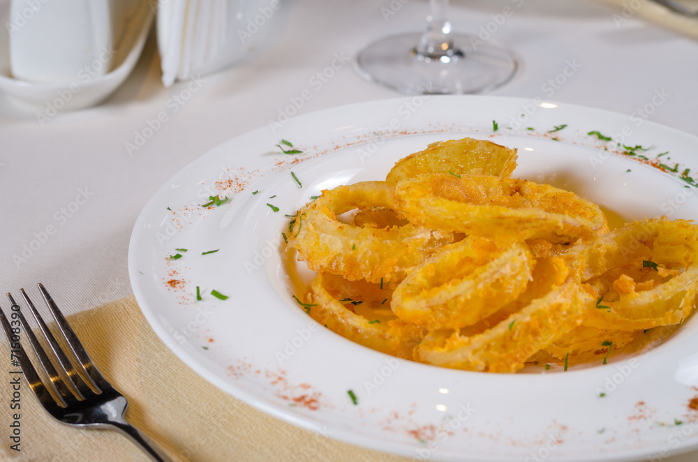 Bowl of Onion Rings at Fancy Table Setting Bowl of Onion Rings at Fancy Table Setting