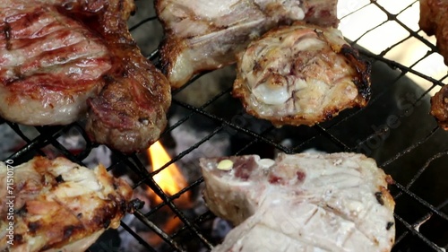 Chicken and Steak Cooking on an Open Fire