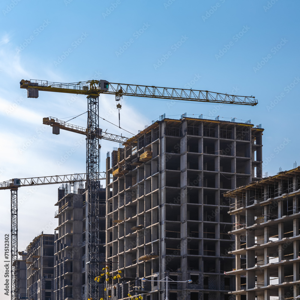 Building cranes on construction