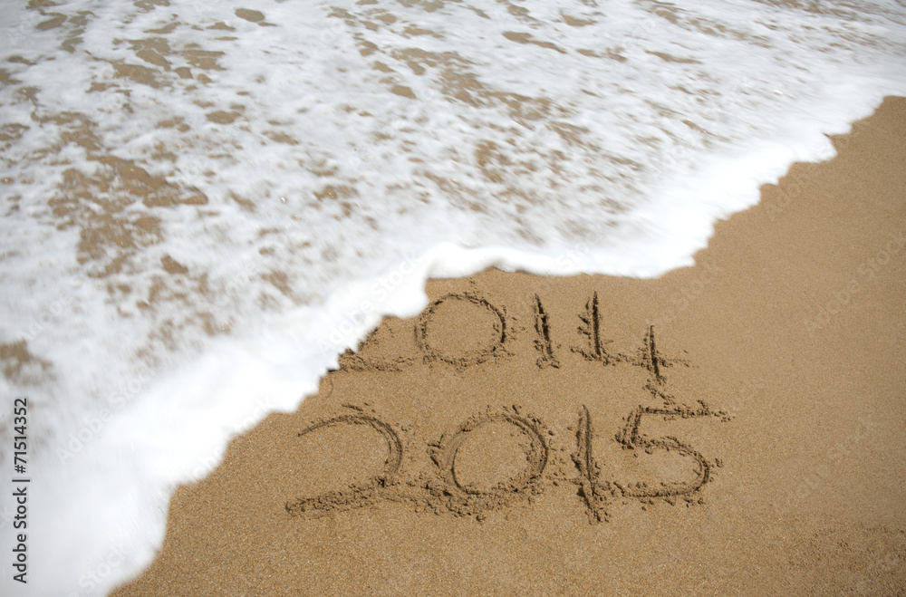 Fototapeta premium The year 2014 being washed away.