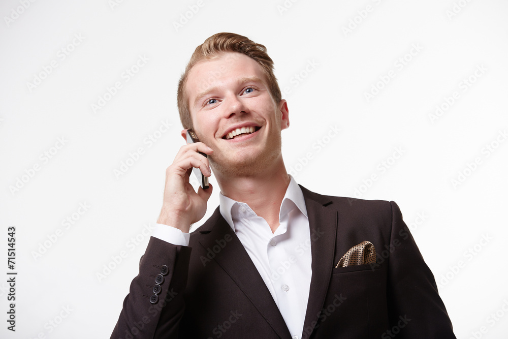 businessman in glasses with a telephone businessman in glasses with a telephone