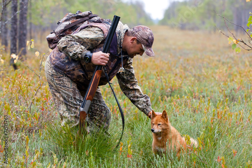 hunter stroking the dog