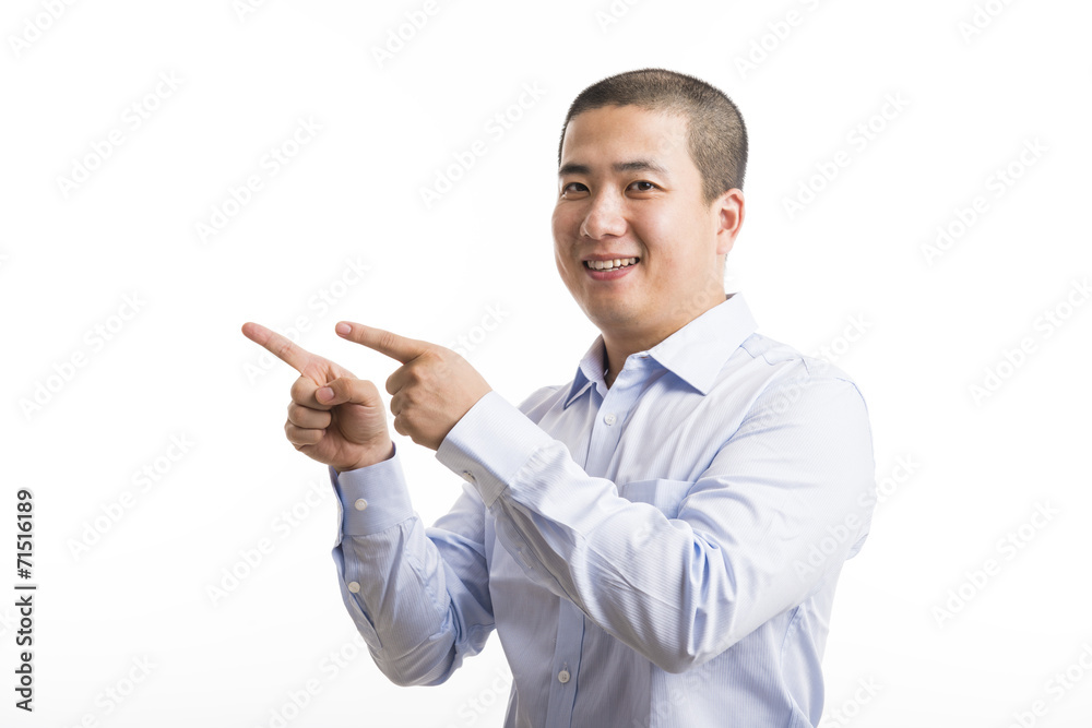 Young business man standing isolated on white