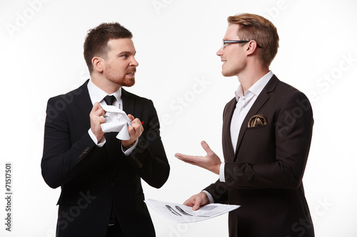 two businessmen arguing