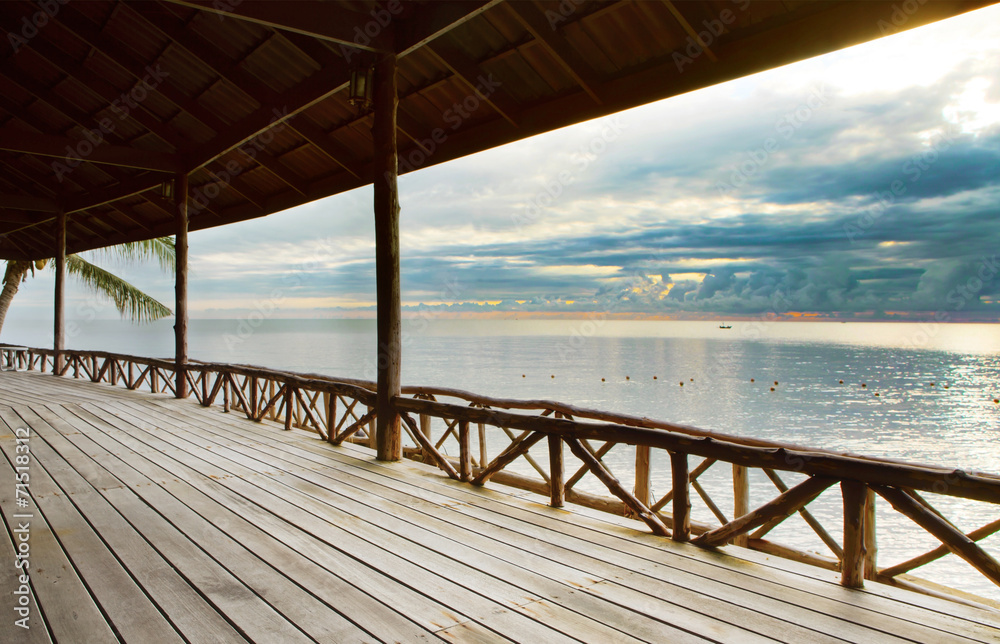 wood terrace in wooden pavillion against peaceful of heaven sea