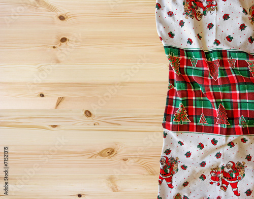 table with christmas tablecloth for background photo