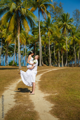 Wedding  bride  groom  sea  palm tree  tropics