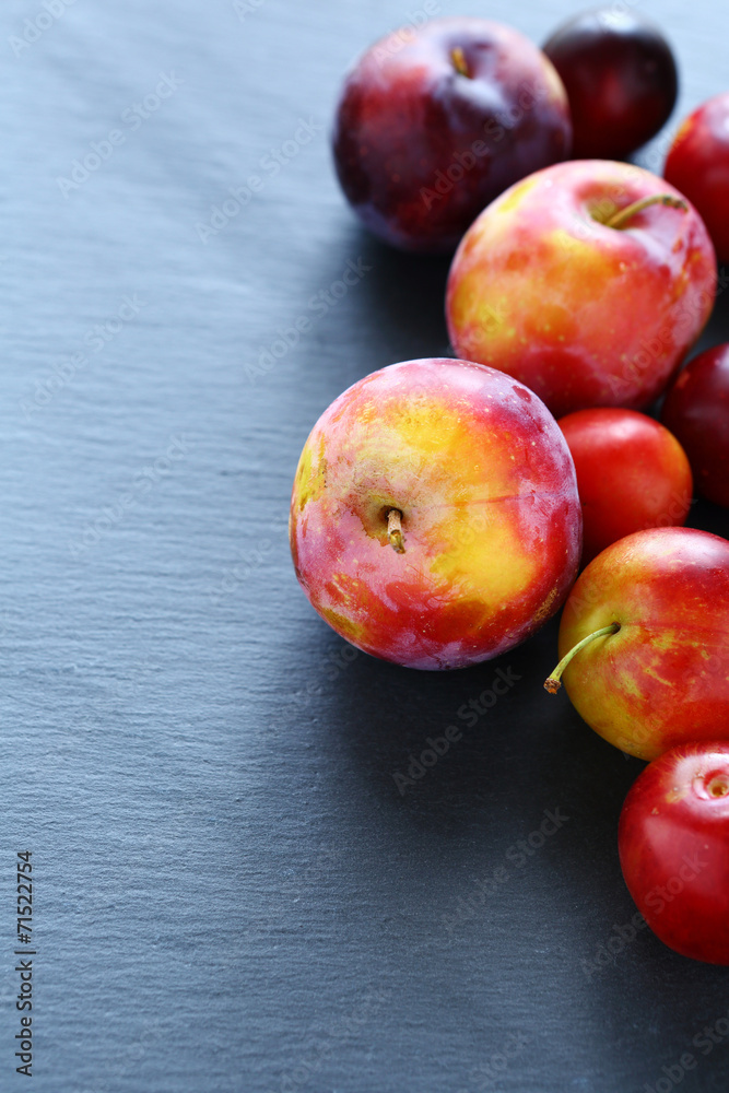 fresh plum on a dark background
