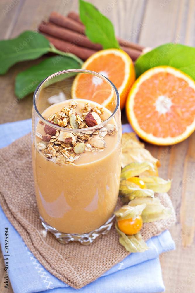 Pumpkin smoothie with granola on top Pumpkin smoothie with granola on top