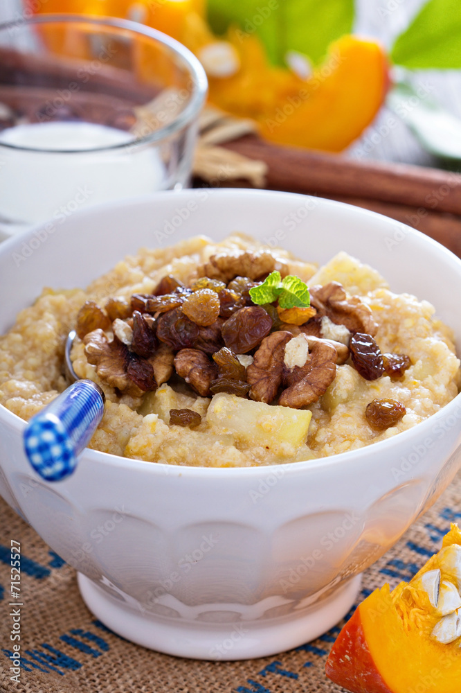 Pumpkin millet porridge with apple and raisins Pumpkin millet porridge with apple and raisins