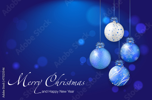 Shiny christmas balls on blue background - place for your text