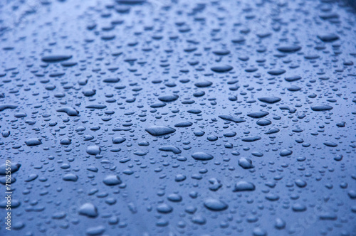 Drops of water on a blue surface