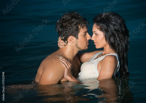 Photography Passionate young couple in water