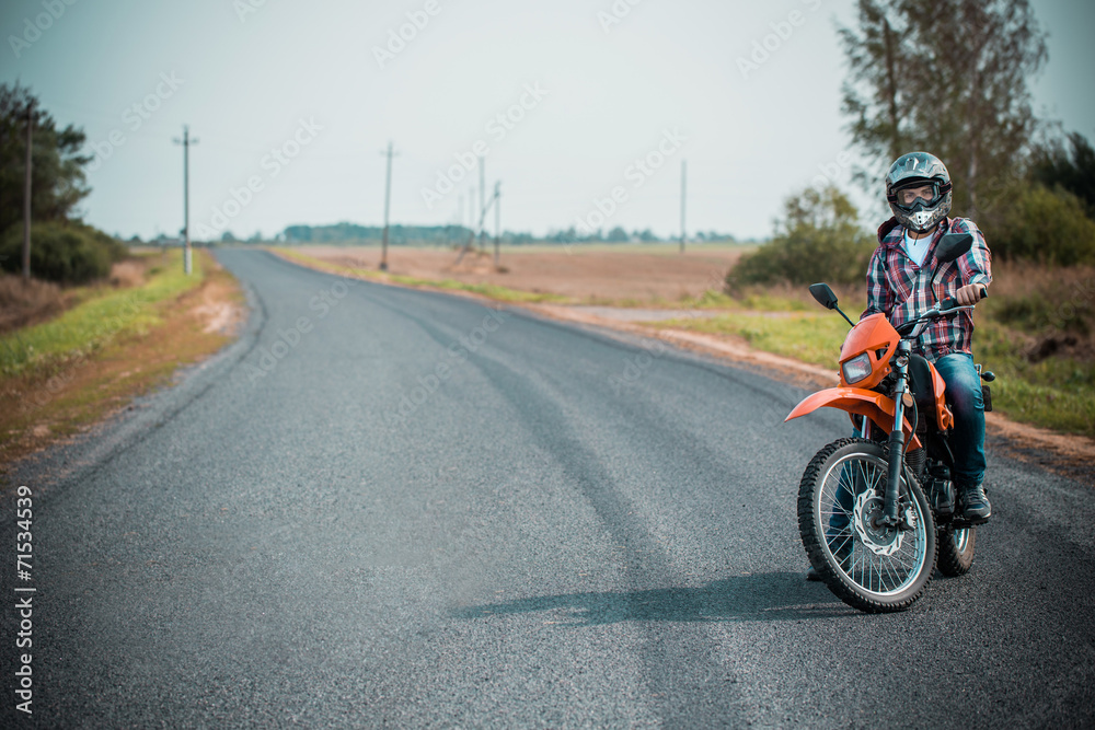 young men on a bike