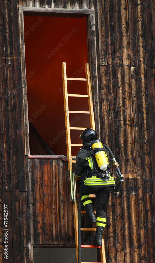 Fireman on the scale during the fire drill Fireman on the scale during the fire drill