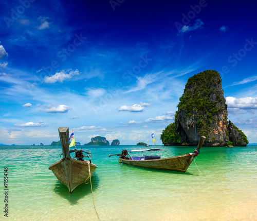 Long tail boats on beach, Thailand © Dmitry Rukhlenko