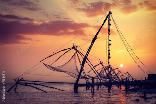 Chinese fishnets on sunset. Kochi, Kerala, India photo