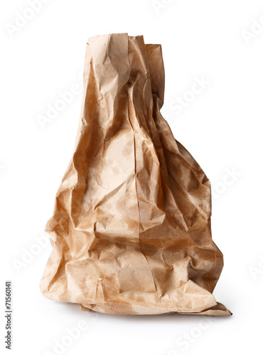 Crumpled paper bag with grease spots