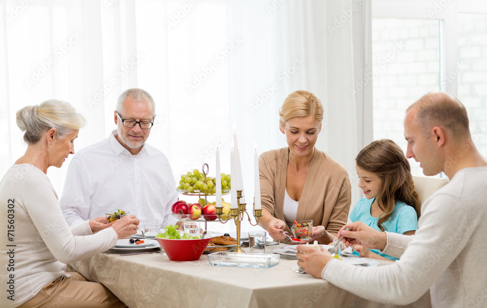smiling family having holiday dinner at home smiling family having holiday dinner at home