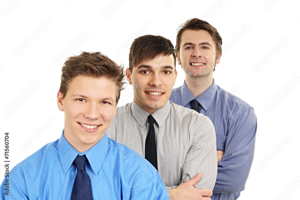 Three business young people shows you thumbs up Three business young people shows you thumbs up