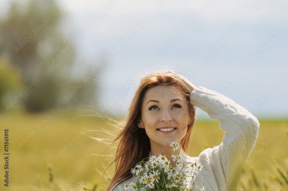 beautiful smiling woman in sunny autumn field with bunch of camo beautiful smiling woman in sunny autumn field with bunch of camo