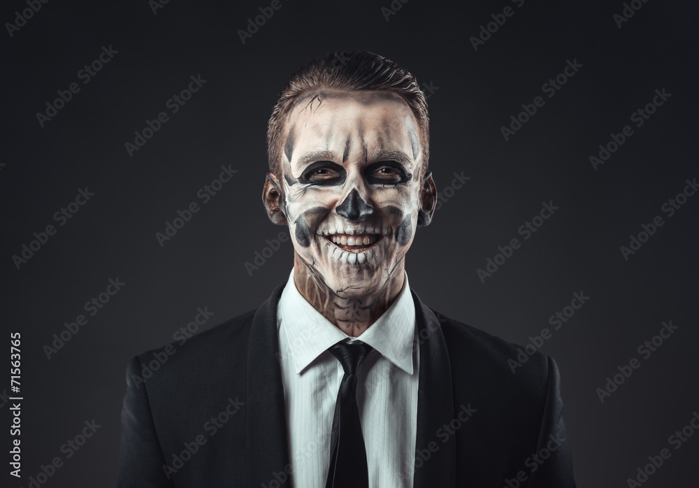 Portrait laughing businessman with makeup skeleton Portrait laughing businessman with makeup skeleton