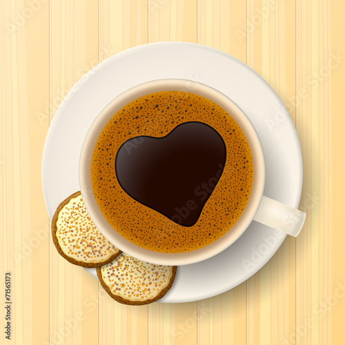 Cup of coffee and cookies on saucer