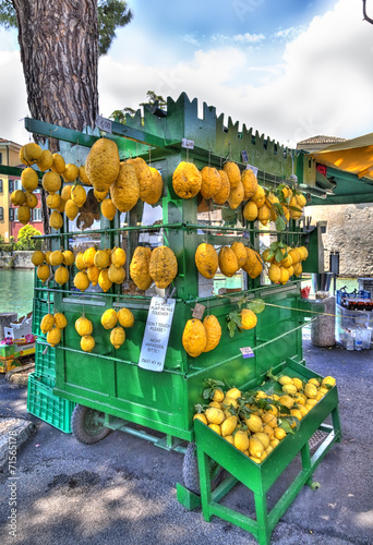Lemons on a shop at a promenade by the Lake Garda