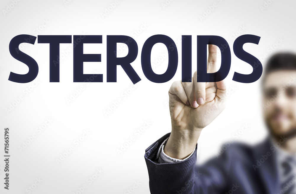 Business man pointing to transparent board with text: Steroids Business man pointing to transparent board with text: Steroids