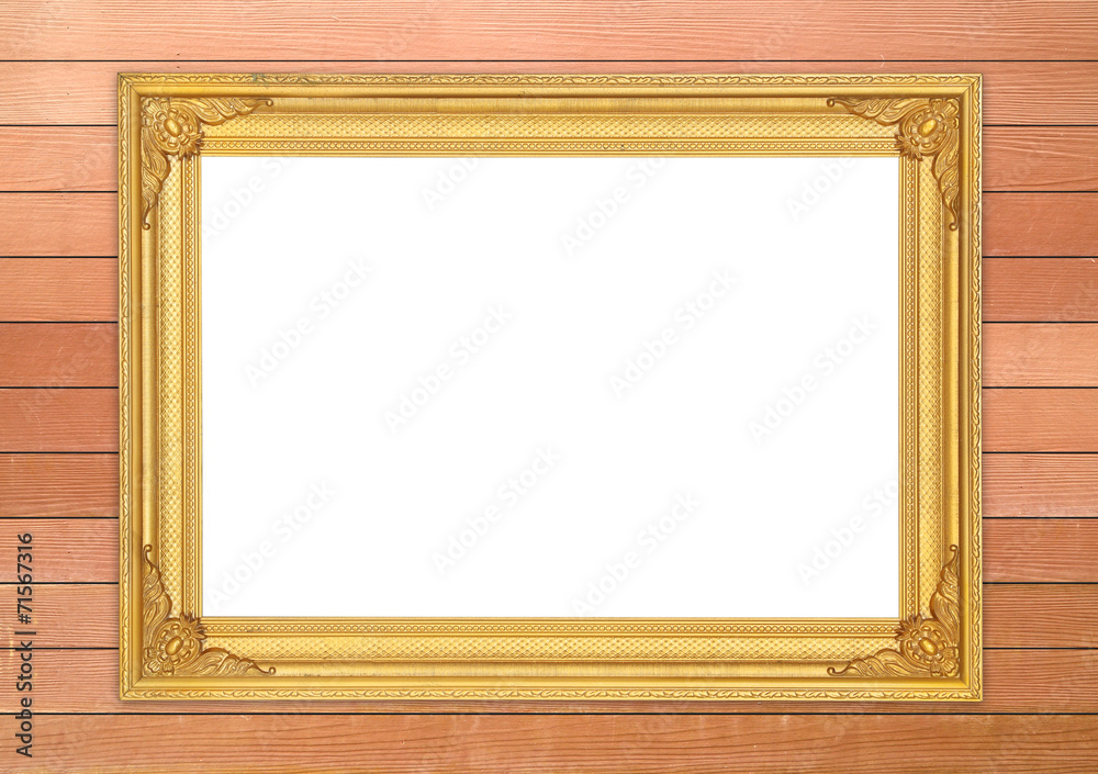 Fototapeta premium blank golden frame on wood wall
