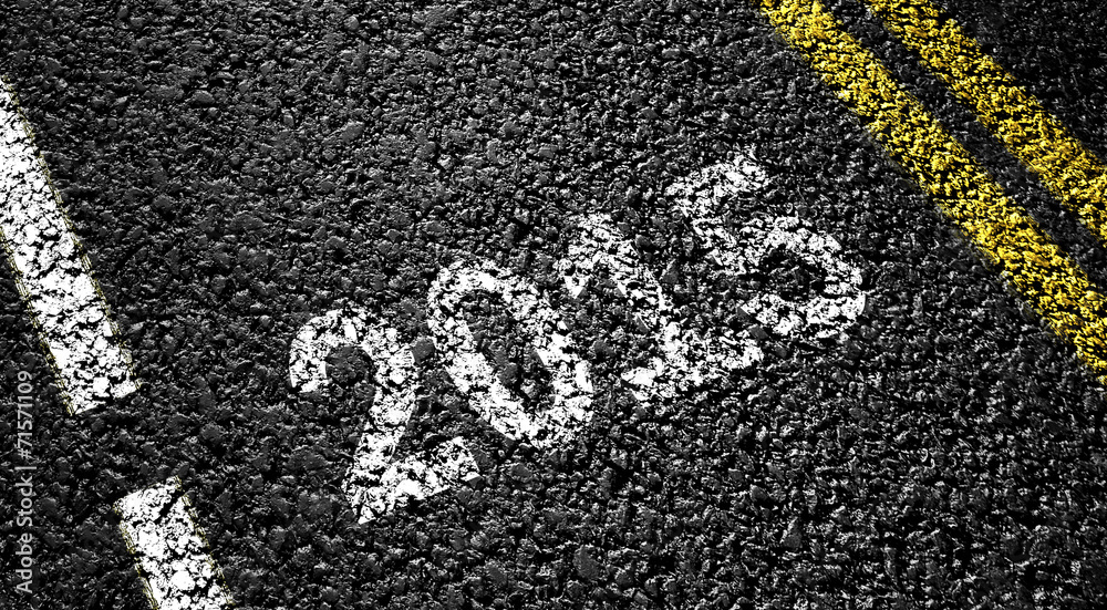 Obraz premium 2015 year on the asphalt road