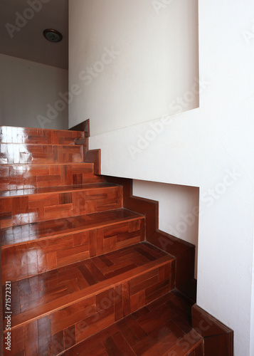 wood staircase with parquet floor