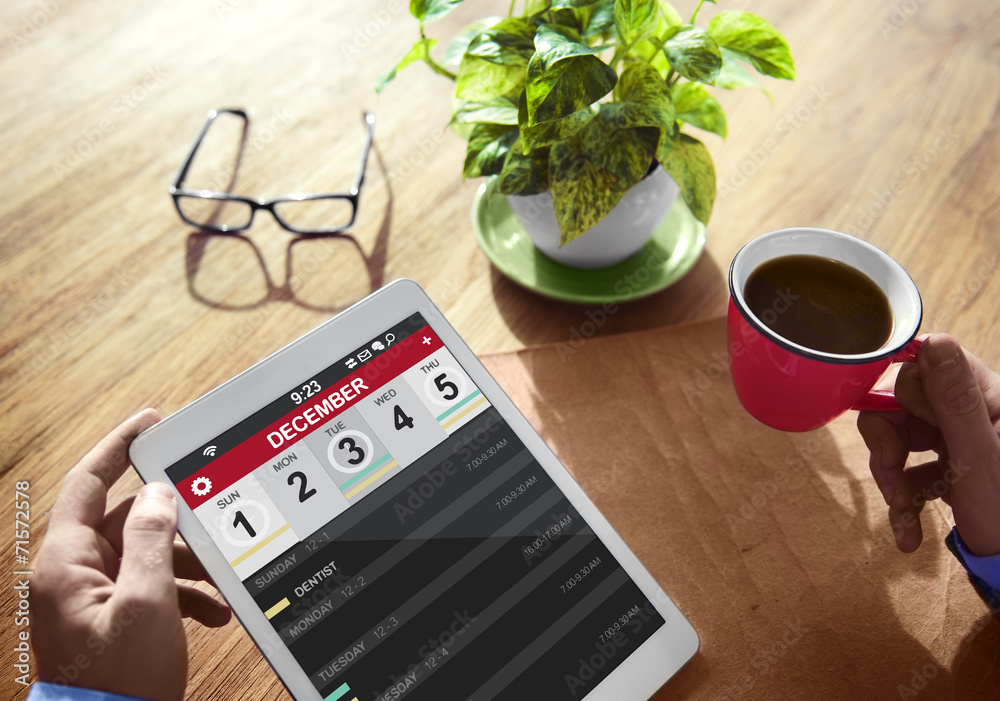Man Planning To Do List on Tablet Man Planning To Do List on Tablet