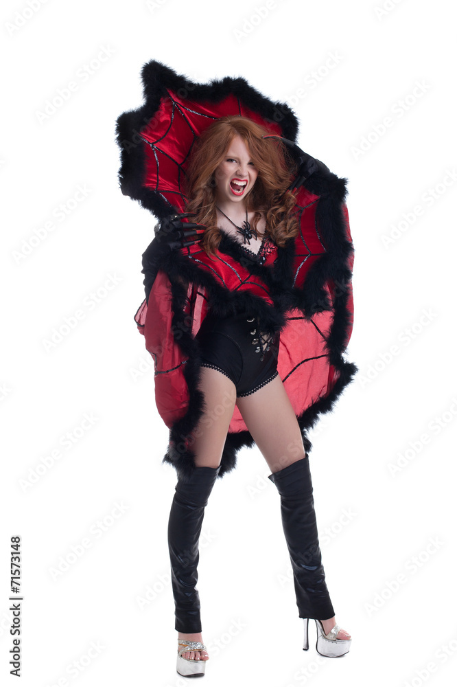 Aggressive girl posing dressed as Queen of spiders Aggressive girl posing dressed as Queen of spiders