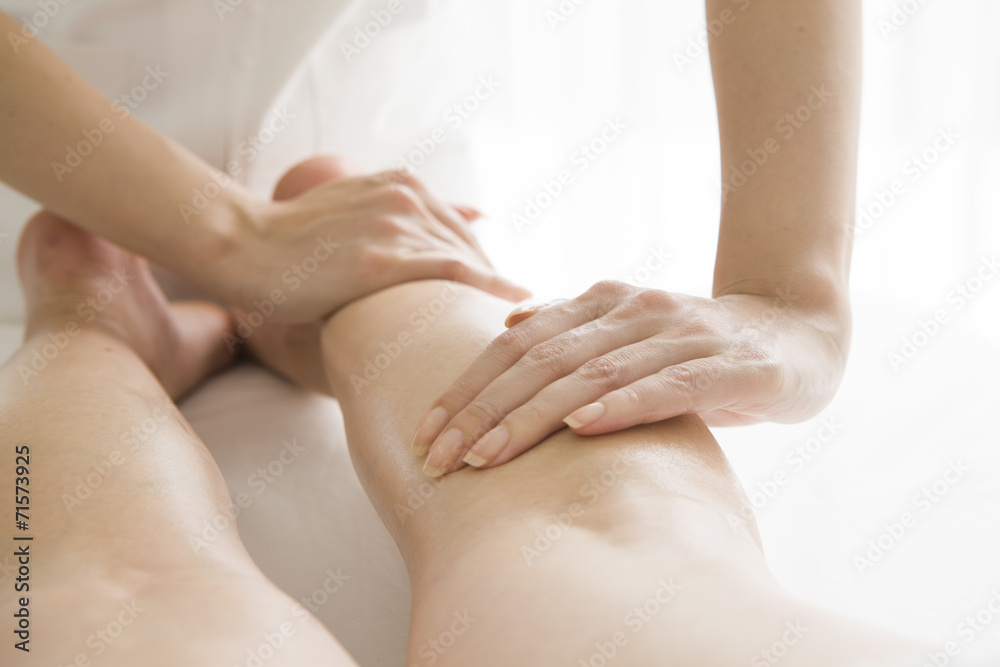 Oil massage of legs
