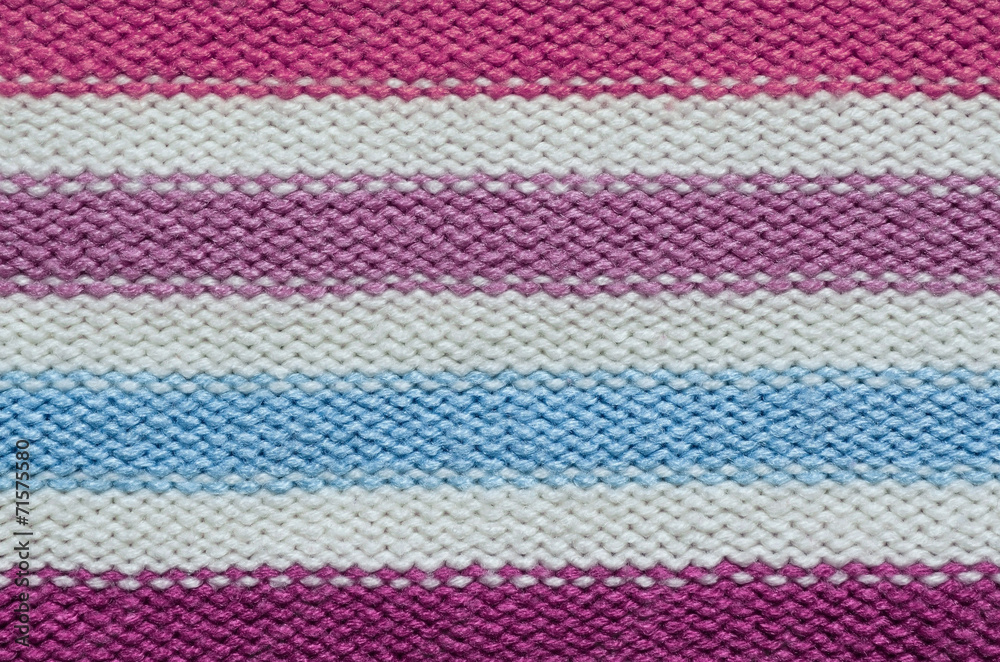 Knit woolen texture. Fabric striped background Knit woolen texture. Fabric striped background