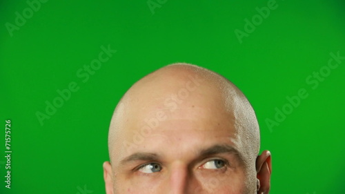 Male eyes on a green screen.FULL HD.