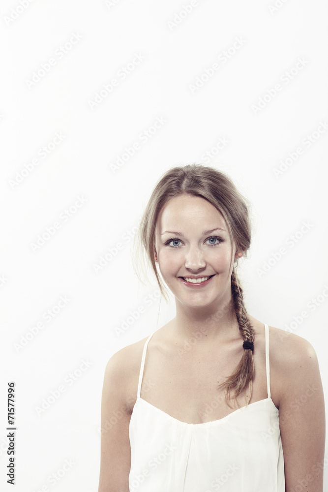 Portrait of beautiful young woman in white, smiling Portrait of beautiful young woman in white, smiling