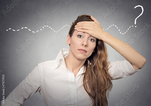 question woman can't solve the problem isolated grey background  photo