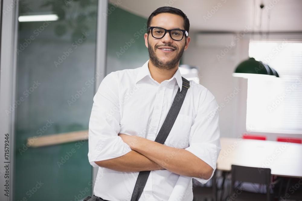 Casual businessman smiling at camera Casual businessman smiling at camera