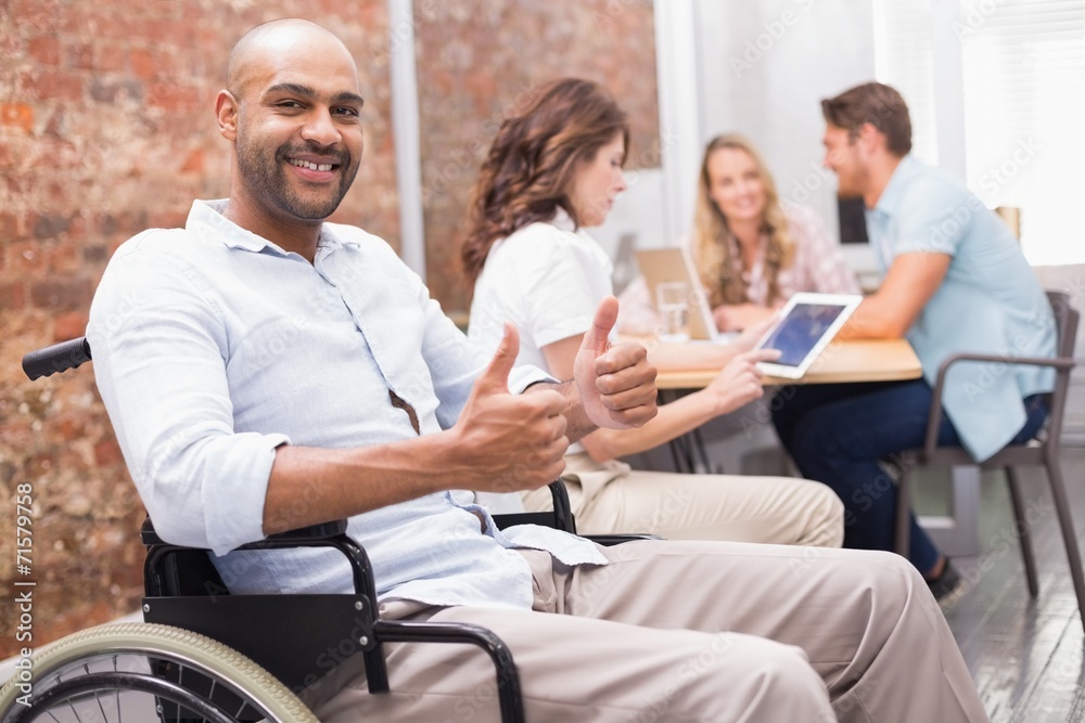Man in wheelchair smiling at camera giving thumbs up Man in wheelchair smiling at camera giving thumbs up