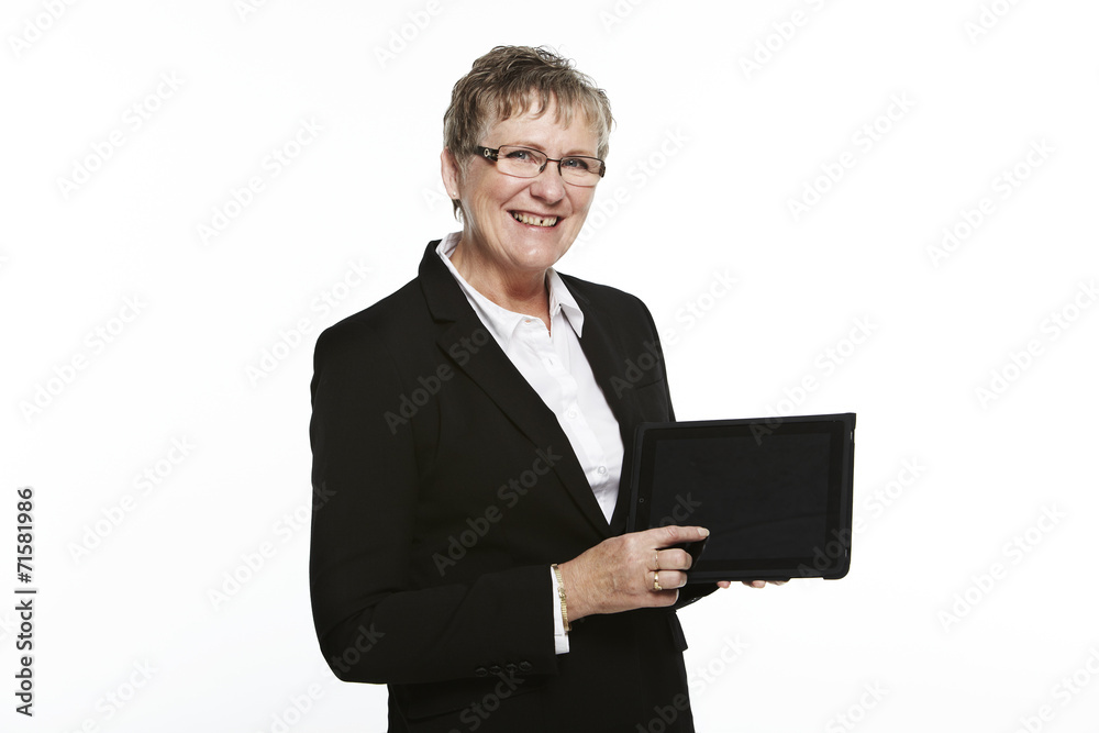 Portrait of senior business woman holding digital laptop Portrait of senior business woman holding digital laptop