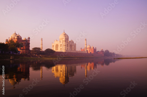 Beautiful Scenery Of Taj Mahal And A Body Of Water