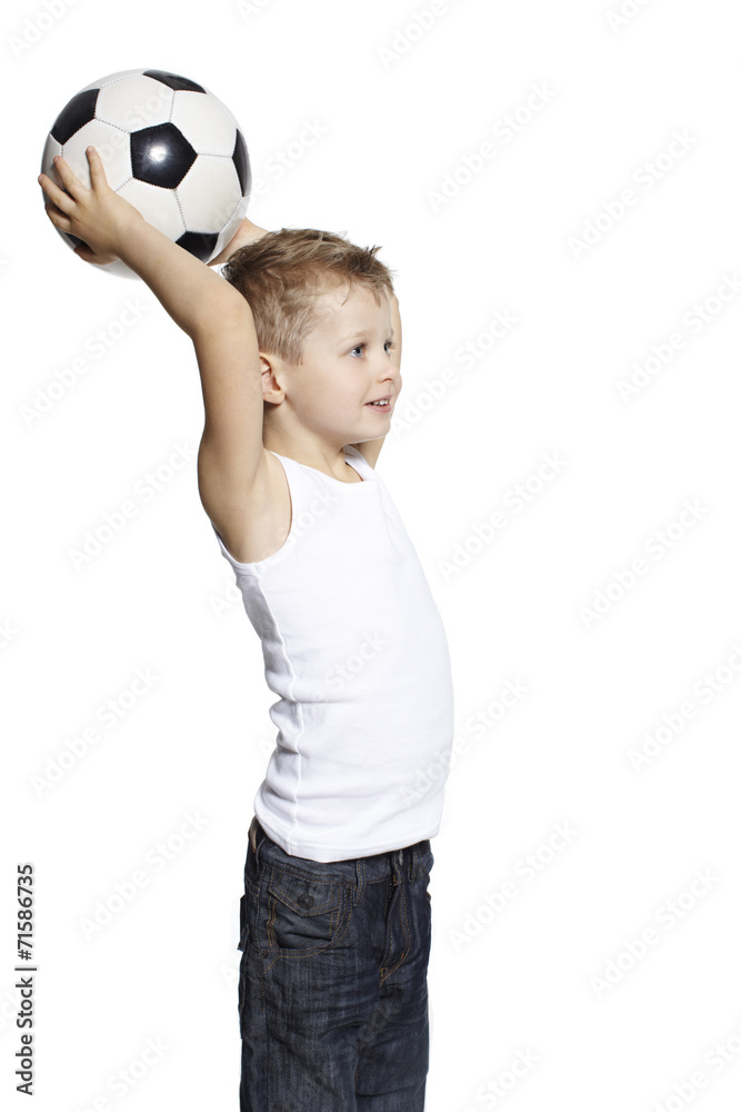 Young boy holding soccer ball, studio Young boy holding soccer ball, studio