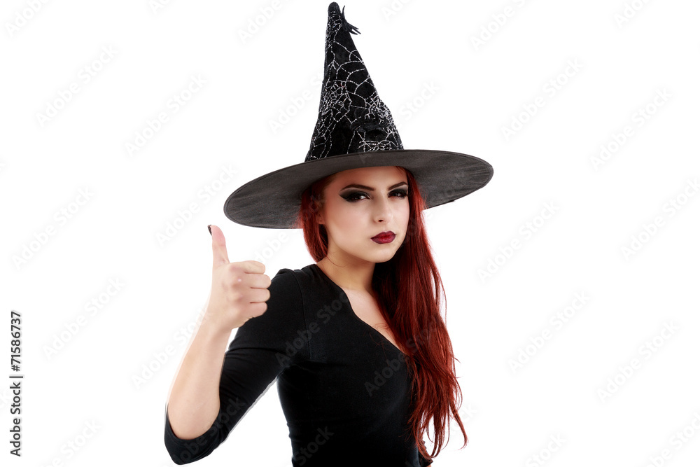 Portrait of young witch shows gesture Portrait of young witch shows gesture