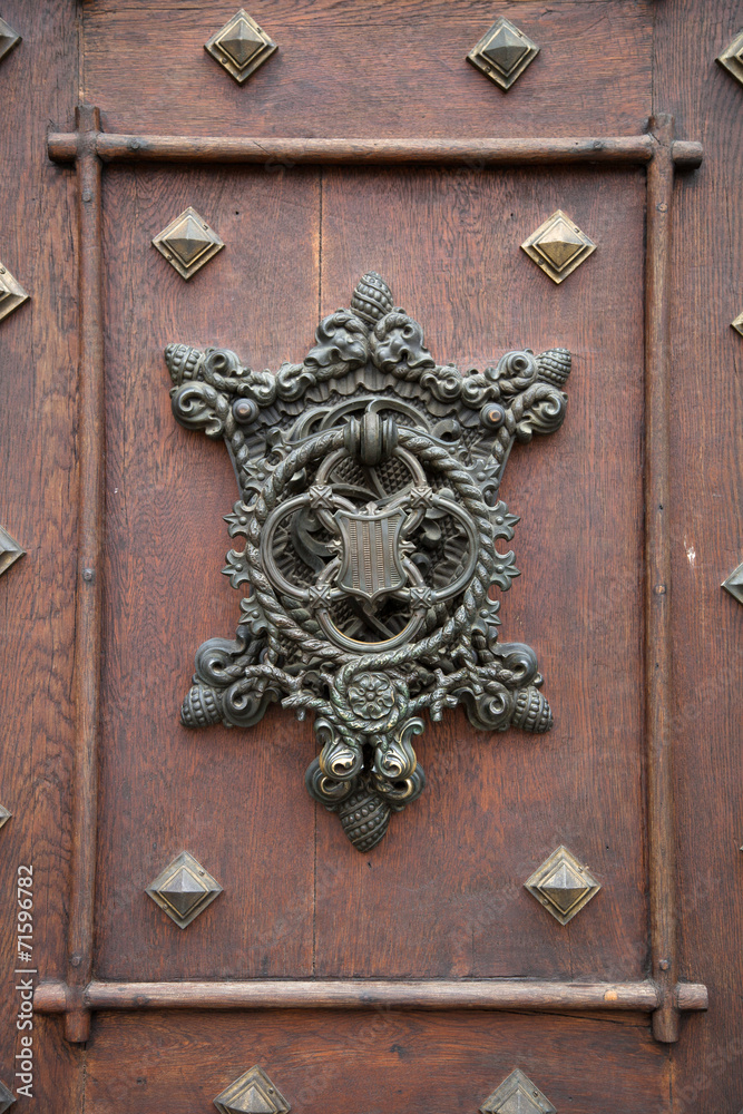 Forged old doorknob with a pattern Forged old doorknob with a pattern